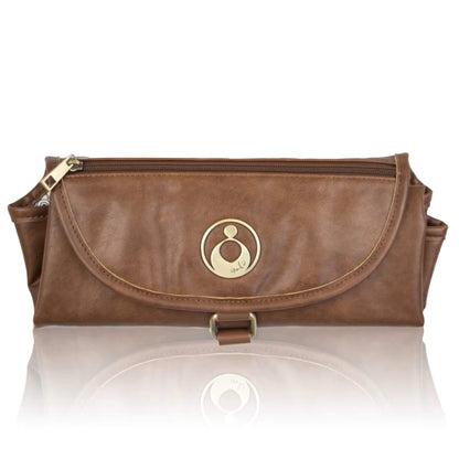 Isoki Change Mat Clutch in redwood chestnut, folded neatly with gold zip and circular brand emblem on the front flap.