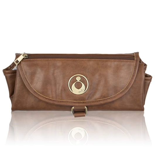 Isoki Change Mat Clutch in redwood chestnut, folded neatly with gold zip and circular brand emblem on the front flap.