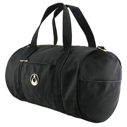 Angled side view of a black nylon duffle changing bag with front zip pocket, rounded ends, and rose-gold trim.