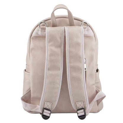 Rear view of mushroom-toned backpack showing padded adjustable shoulder straps, top carry handle, and subtle stitching details.