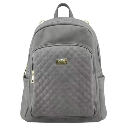 Isoki Marlo Backpack Nappy Changing Bag in Stone, featuring a quilted front pocket, soft suede-look finish, and gold zip detailing.
