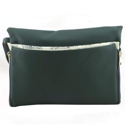 Back view of green change mat clutch with a zip pocket and floral patterned lining visible along the opening.