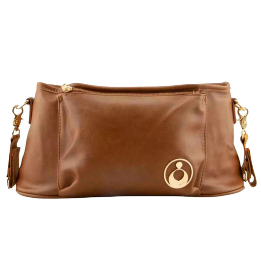 Isoki Tully Stroller Caddy in Amber shown from the front, made from smooth vegan leather with gold hardware and a zipped pocket design.