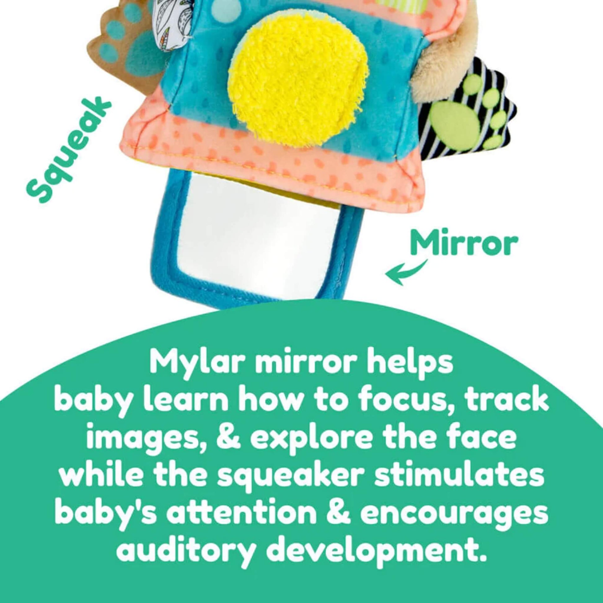 Fabric baby toy with a bright mylar mirror and yellow squeaky button on its camera front to support sensory and auditory play.