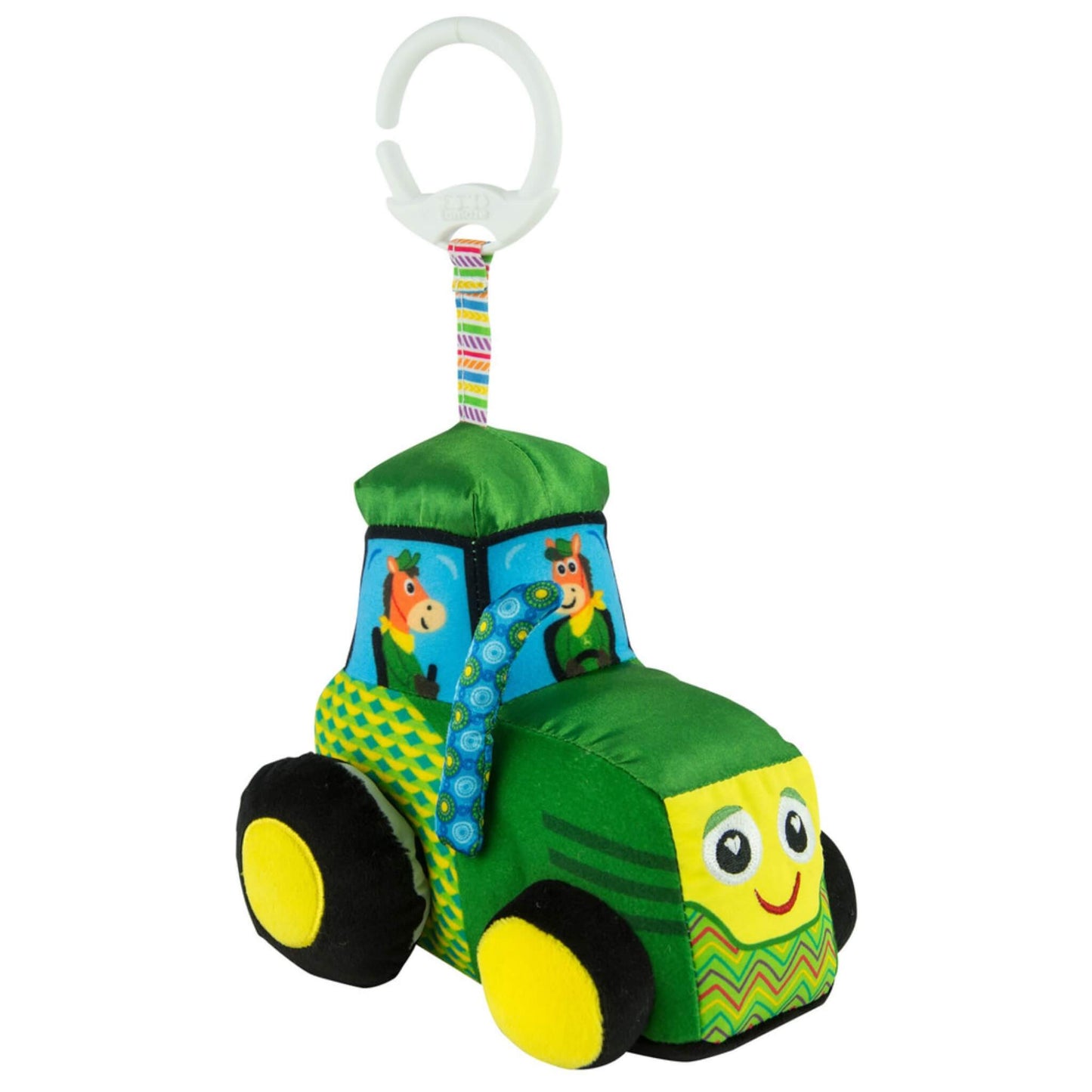 Plush green tractor baby toy with patterned textures and cheerful animal driver illustrations on the cab windows.