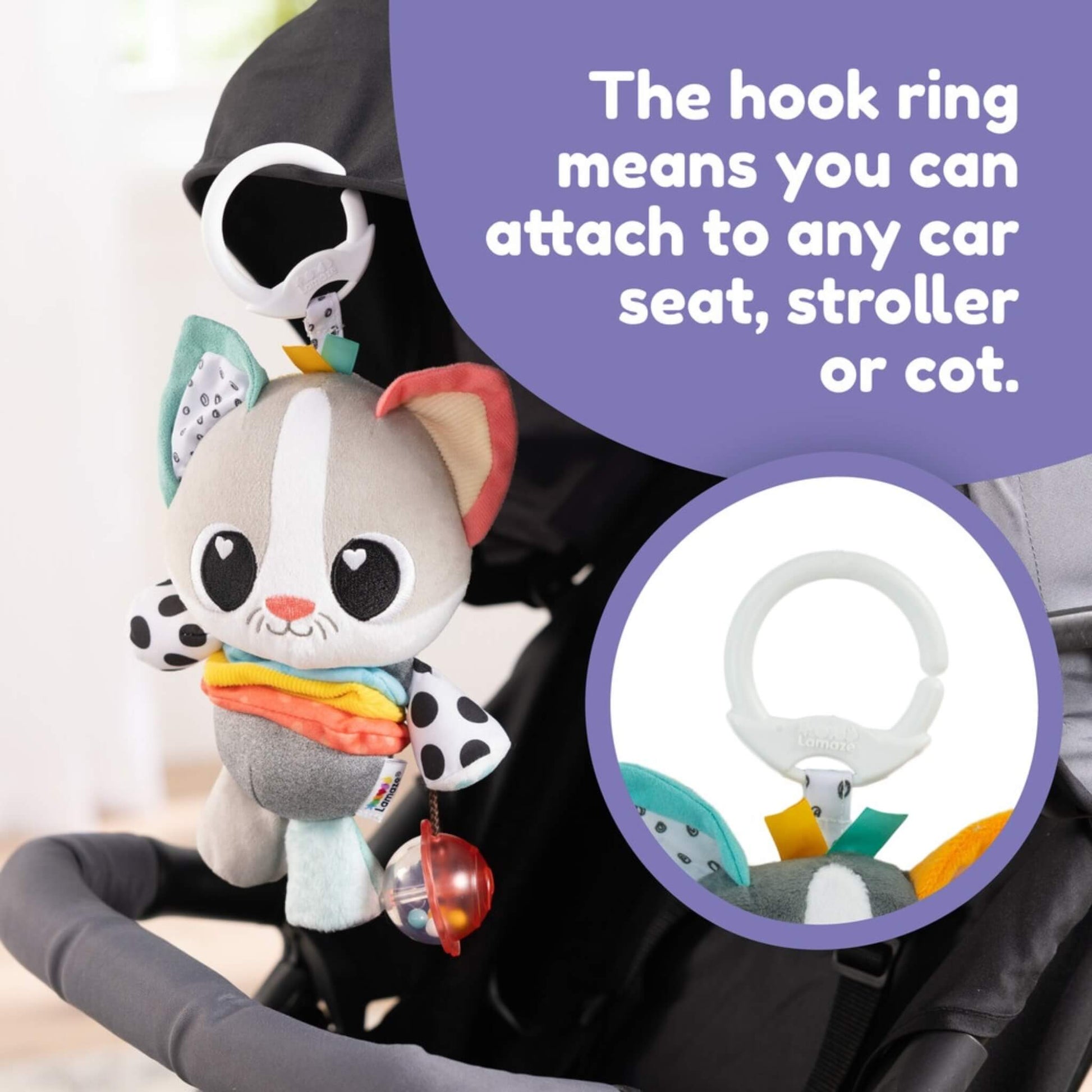 Baby activity toy attached to a stroller handle with a white clip, showing how it can be used for play during outings.