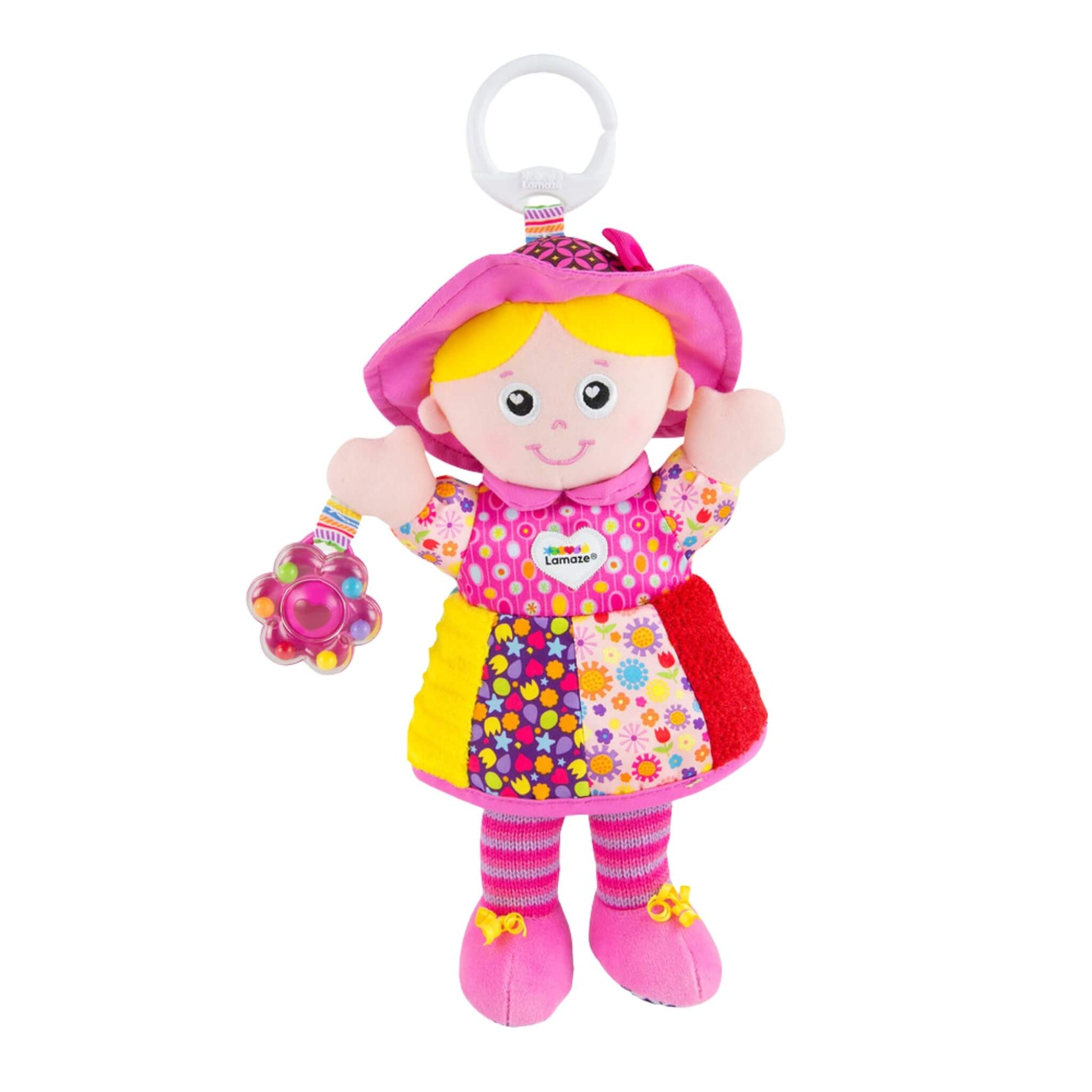 Lamaze My Friend Emily baby toy featuring a soft doll with a pink hat, patchwork dress, yellow hair, and flower rattle attached to her hand with a white clip for easy attachment.