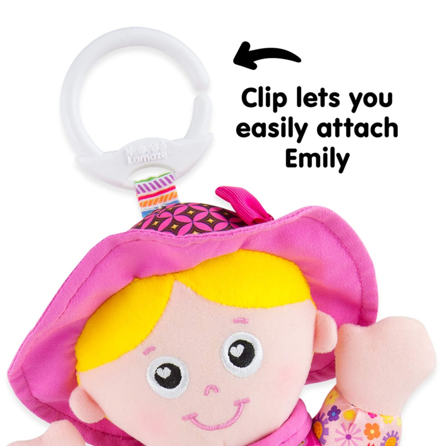 Top section of the doll showing her smiling face, bright pink hat, and white clip for attaching to a pram, car seat, or bag.