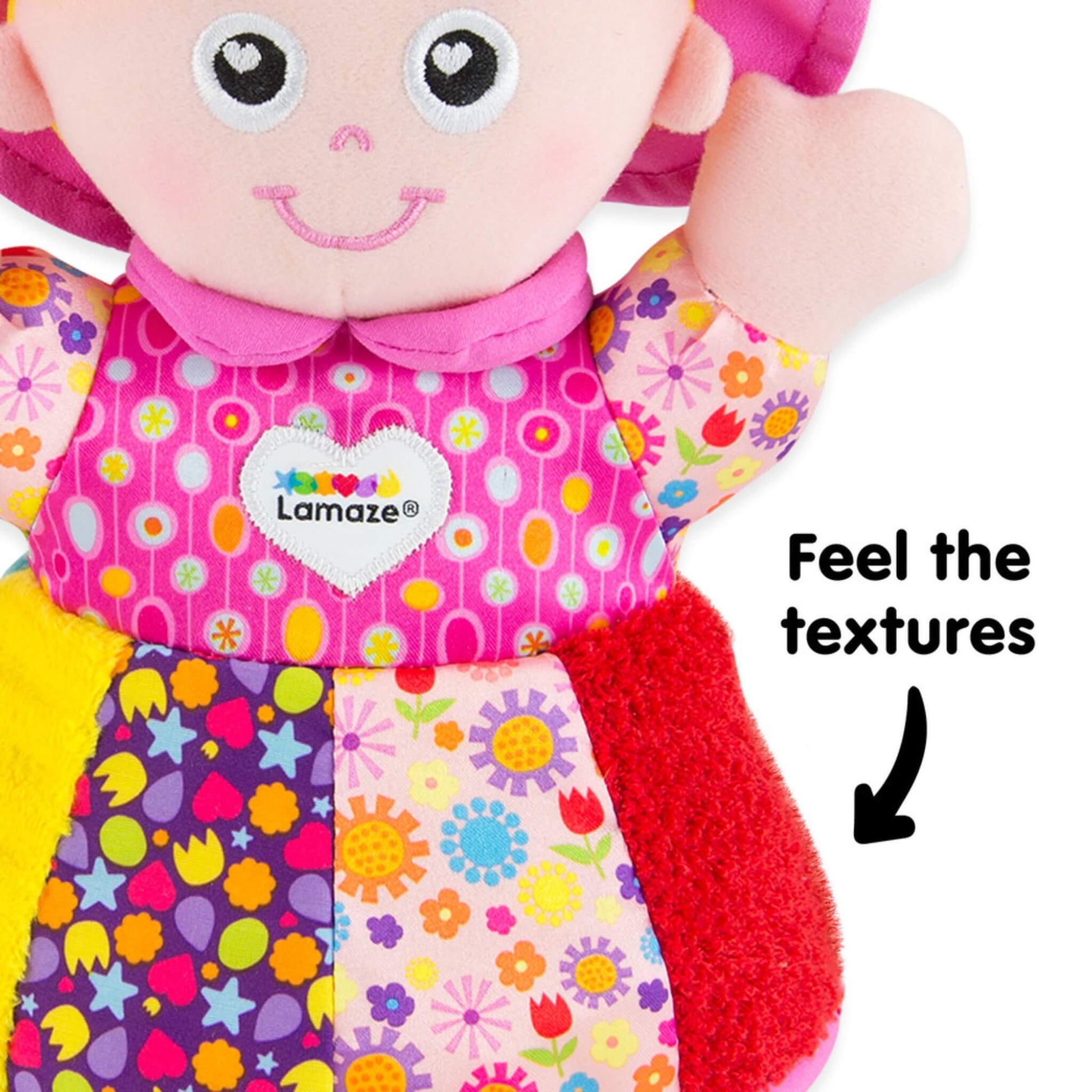 Close-up of the doll’s colourful dress showing different fabrics and patterns with text encouraging touch and texture exploration.