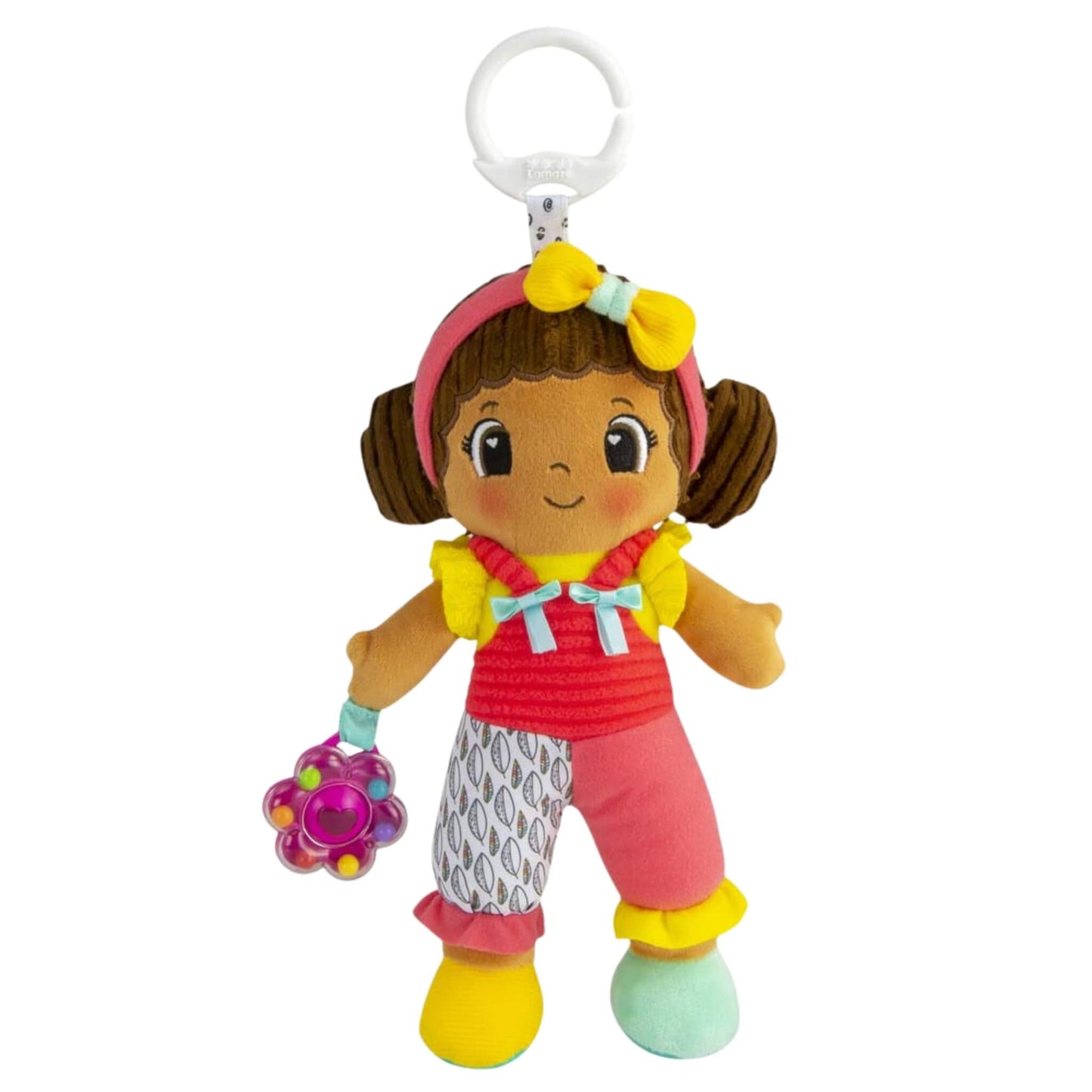 Lamaze My Friend Jasmine soft baby doll toy with brown hair in pigtails, wearing bright red overalls, yellow shoes and a pink headband, holding a flower-shaped rattle with an on-the-go clip attached.