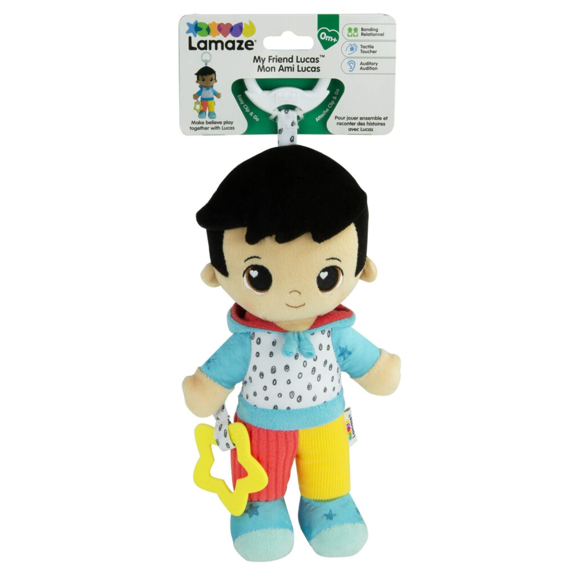 Lamaze My Friend Lucas doll displayed in retail packaging, showing its bright outfit, soft body and attached star teether.