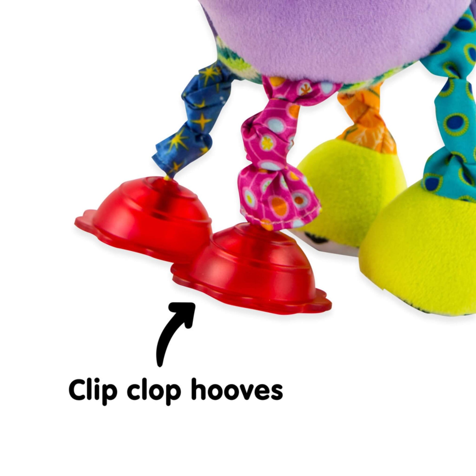 Close-up of red plastic hooves that create a clip-clop sound when the unicorn toy is moved.