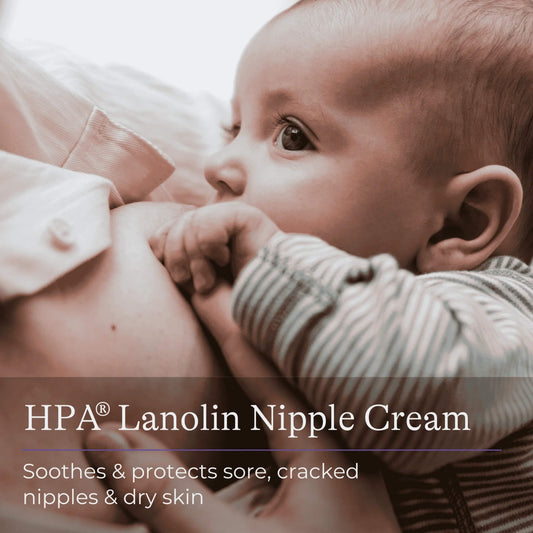 Close-up of a baby breastfeeding, illustrating how lanolin nipple cream helps protect and soothe the nipple area for comfort during nursing.