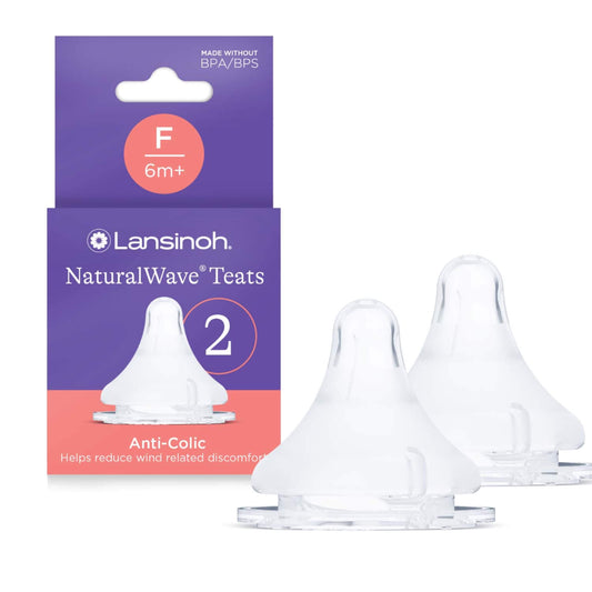 Lansinoh NaturalWave Teats 2 pack in fast flow size for 6 months+, shown in branded retail packaging alongside two clear silicone bottle teats with anti-colic design.