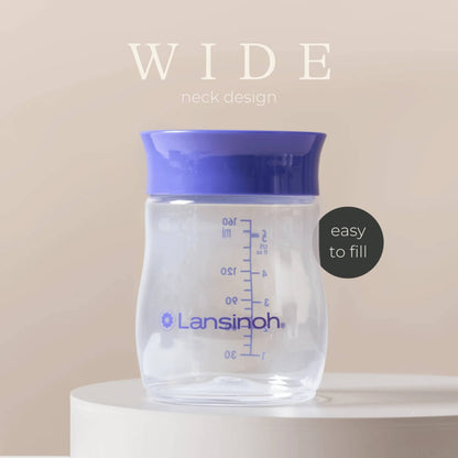 Close-up of wide-neck baby milk storage bottle with purple lid and clear measurement markings, highlighting easy-fill design.