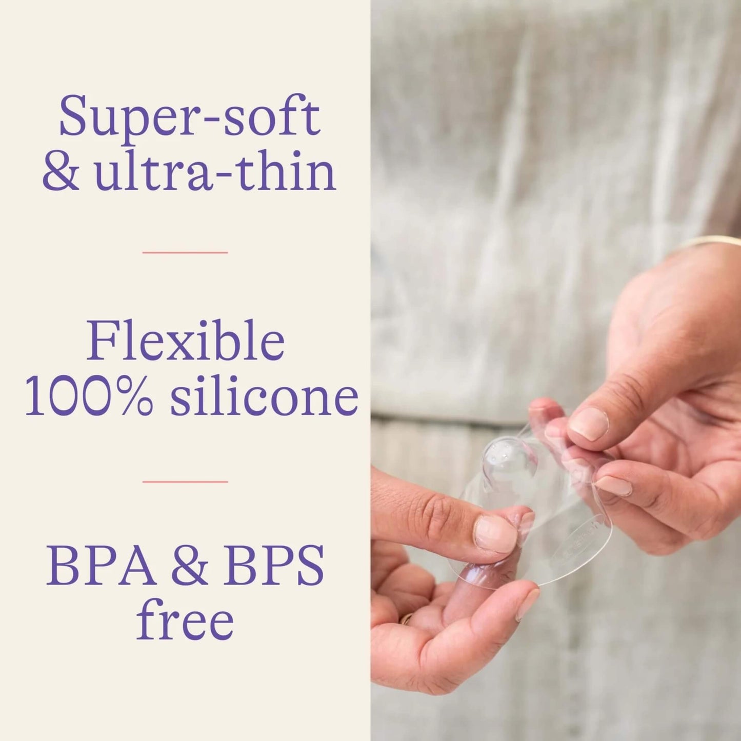 Hands gently stretching and holding a transparent silicone nipple shield to show its soft, flexible material and thin shape.