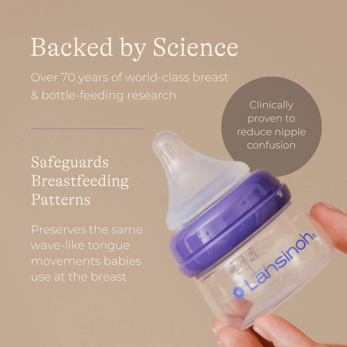 Small feeding bottle held in a hand with a close-up view of the teat shape and bottle design.