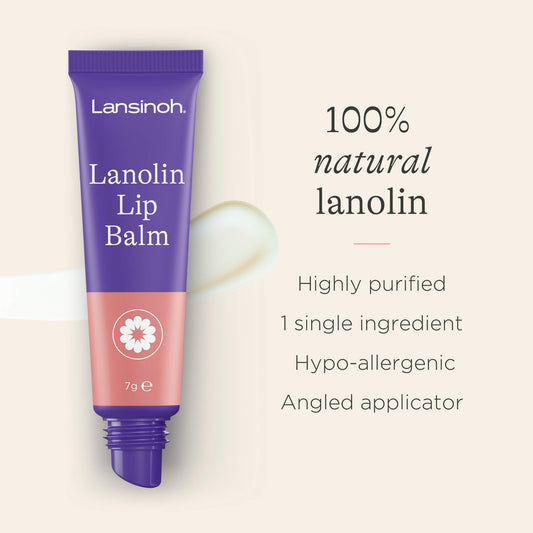 An opened tube of lip balm with a small swipe of balm beside it, highlighting the angled applicator and smooth lanolin texture.