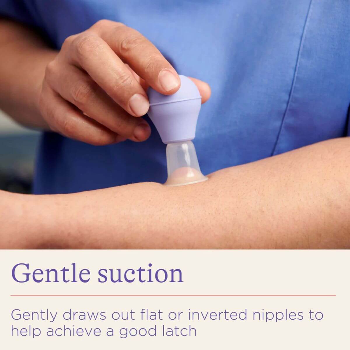 A LatchAssist nipple inverter being used to create gentle suction, which helps draw out flat or inverted nipples to aid in achieving a good latch for breastfeeding.