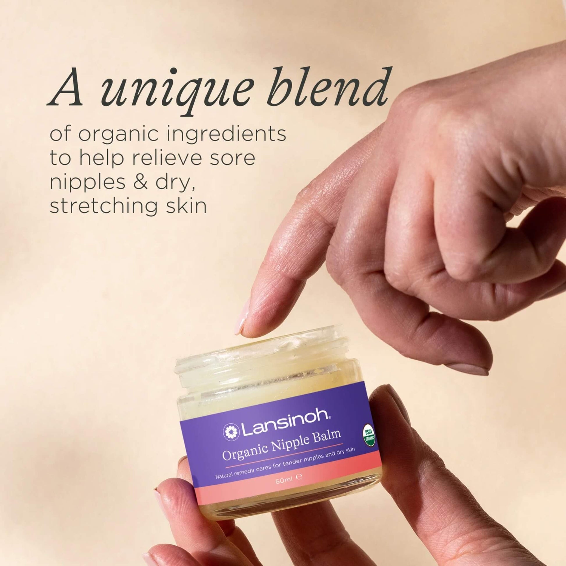 A woman applying nipple balm from an open jar, with text describing a blend of organic ingredients for sore nipples and dry, stretching skin.