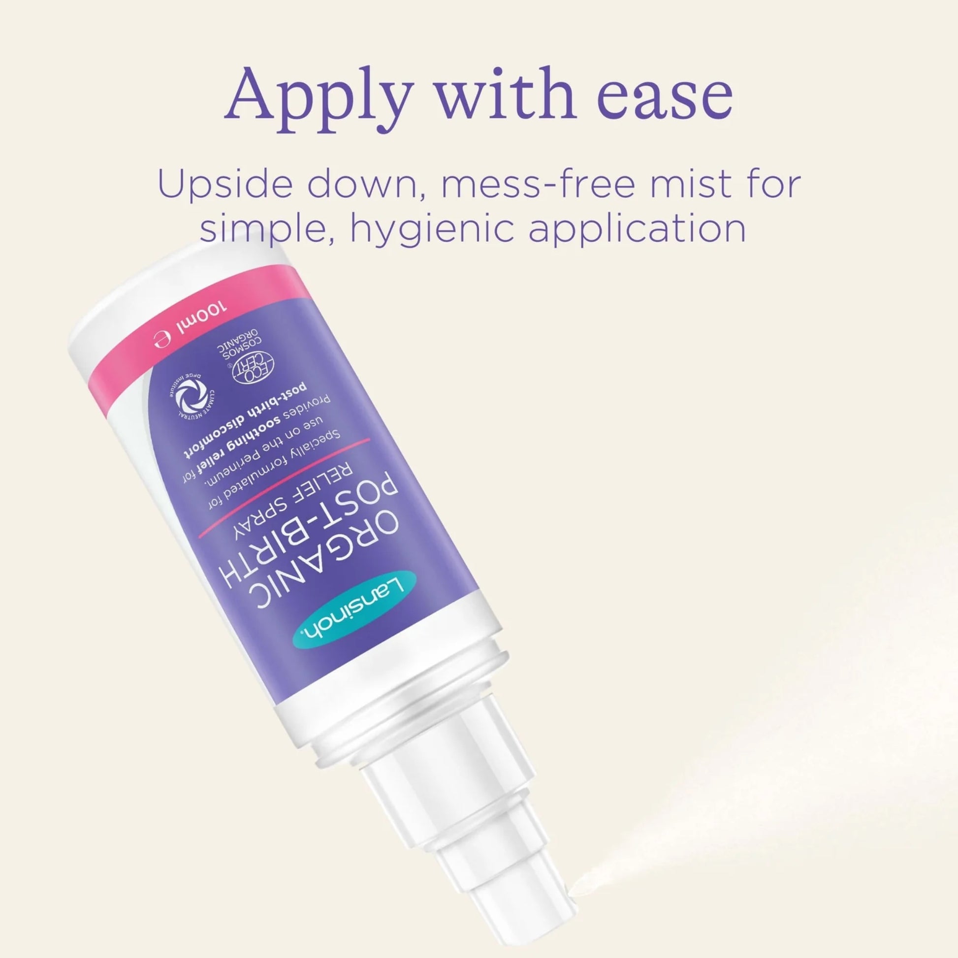 Bottle of post-birth relief spray shown upside down releasing a fine mist, demonstrating hygienic, mess-free application from any angle.