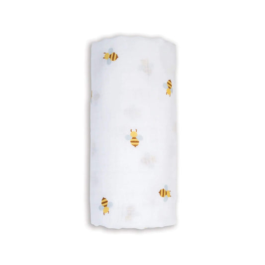 Soft Lulujo Cotton Muslin Swaddle in the Bees design, neatly rolled to show its lightweight white fabric patterned with yellow and brown bees.