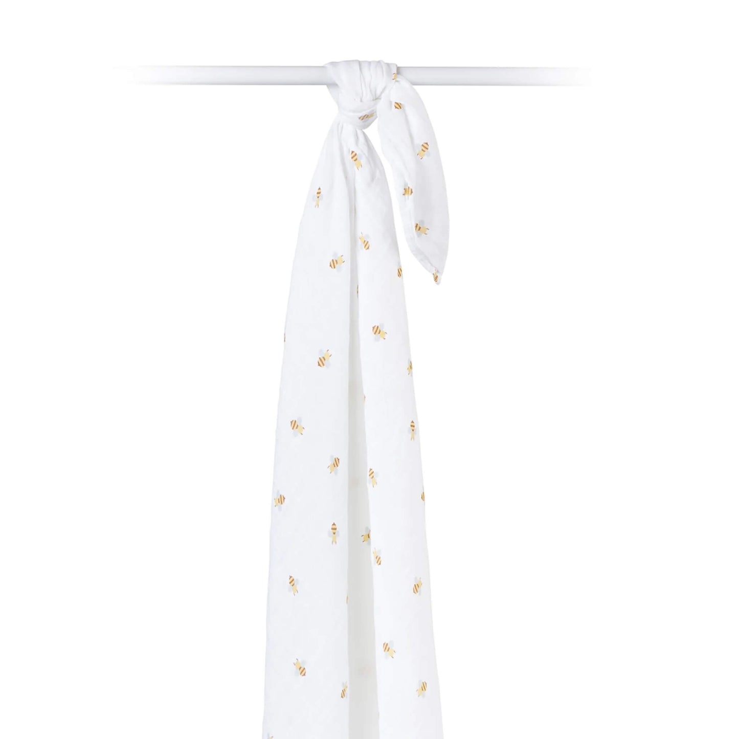 Bee-print cotton muslin swaddle draped over a rod, highlighting the breathable and airy texture of the material.