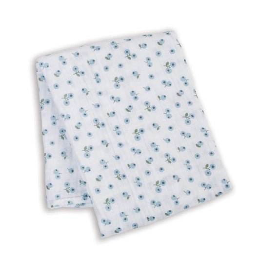 Lightweight muslin swaddle folded flat, showing the repeating pattern of small blue berries with green stems across the white cotton fabric.