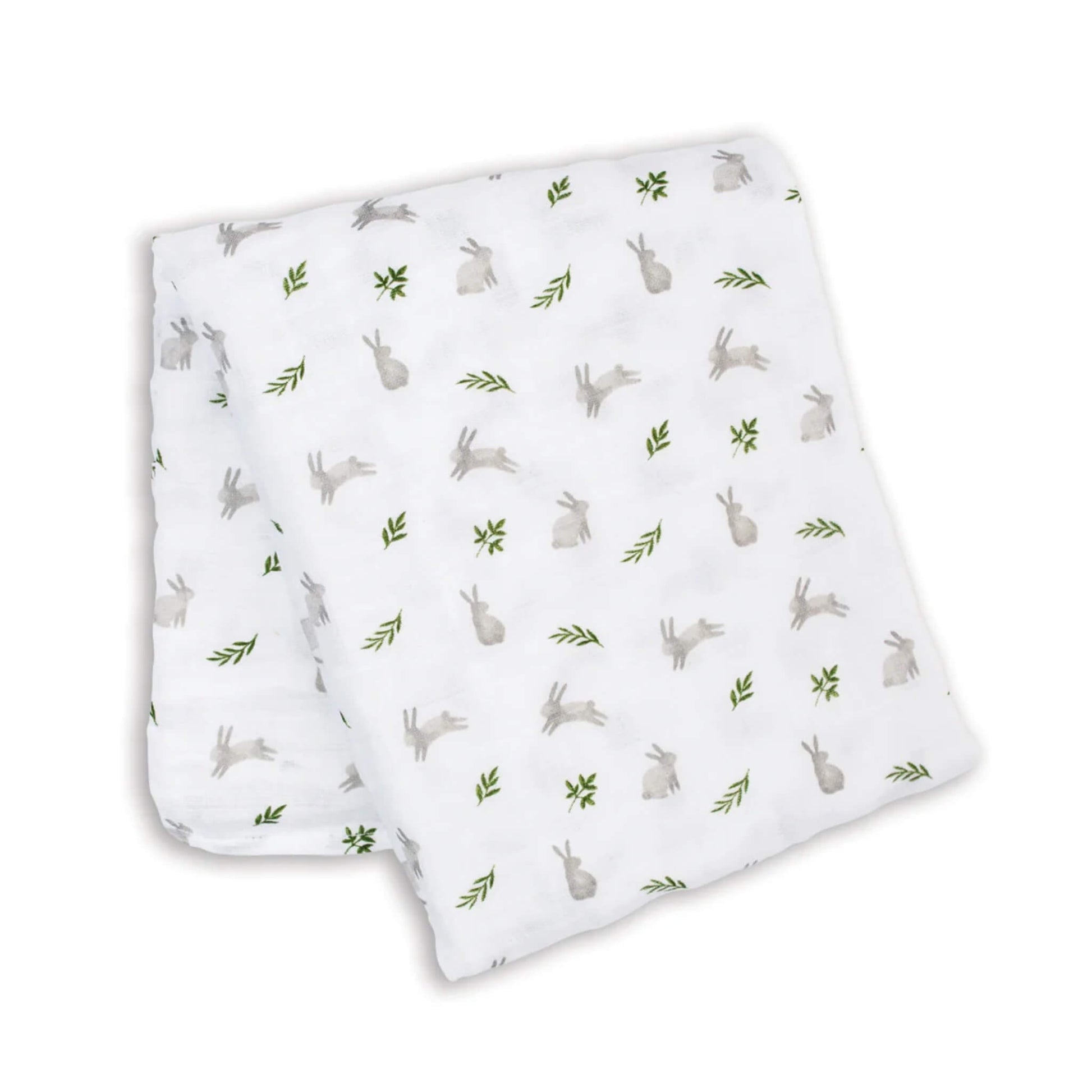 Lightweight muslin swaddle folded flat, showing a repeating pattern of grey bunnies and green leaves across the white cotton fabric.