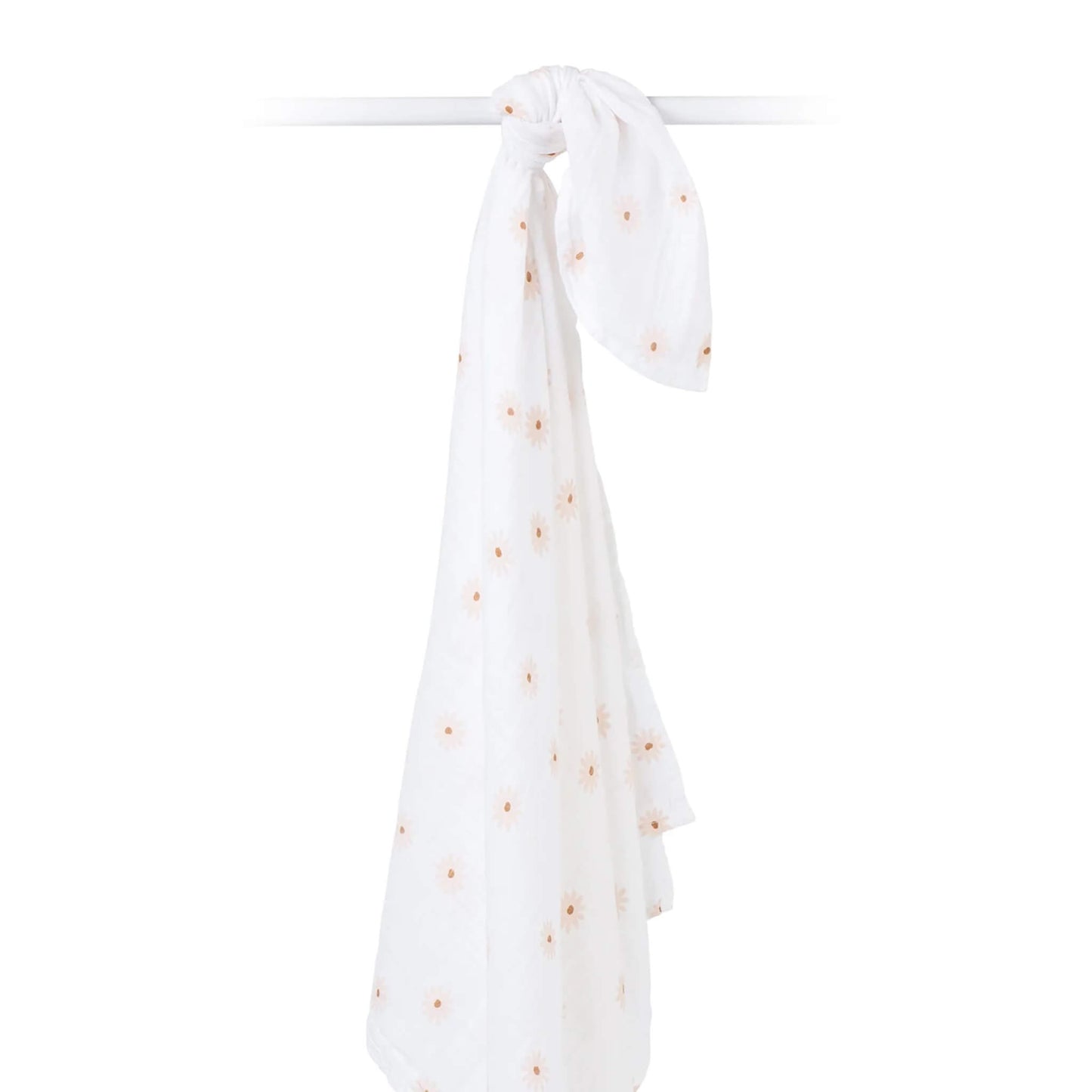 Cotton muslin swaddle draped over a rod, highlighting its airy weave and delicate daisy print.