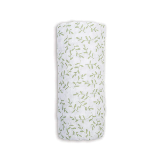 Lulujo Cotton Muslin Swaddle in the Greenery design, neatly rolled to show its soft white fabric patterned with delicate green leafy sprigs.