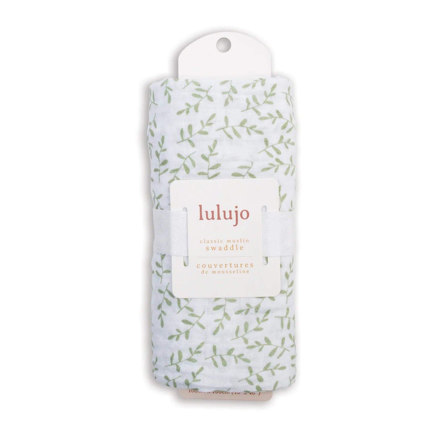 Swaddle rolled in its Lulujo packaging with the label visible, showing the pale green leaf pattern through the fabric.