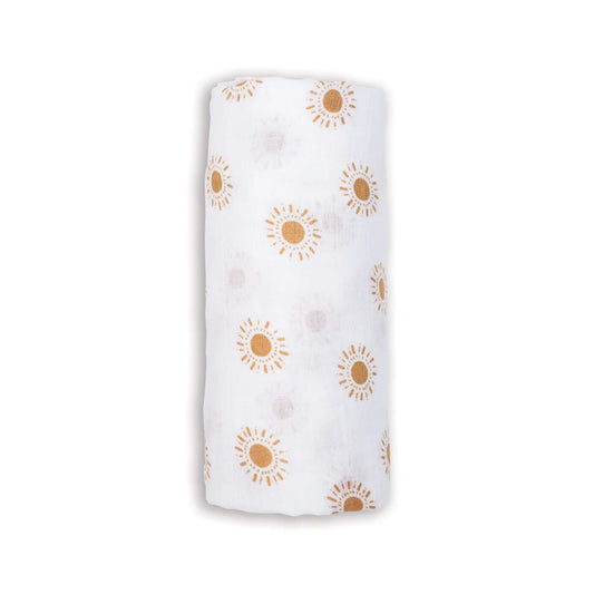Lulujo Cotton Muslin Swaddle in the Suns design, rolled neatly to show soft white fabric patterned with warm golden sun illustrations.