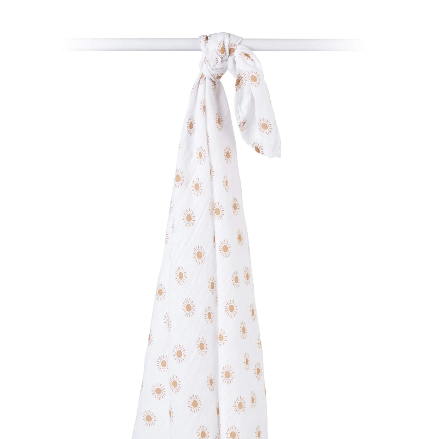 Cotton muslin swaddle draped over a rod, showing airy weave and cheerful sun pattern in earthy tones.