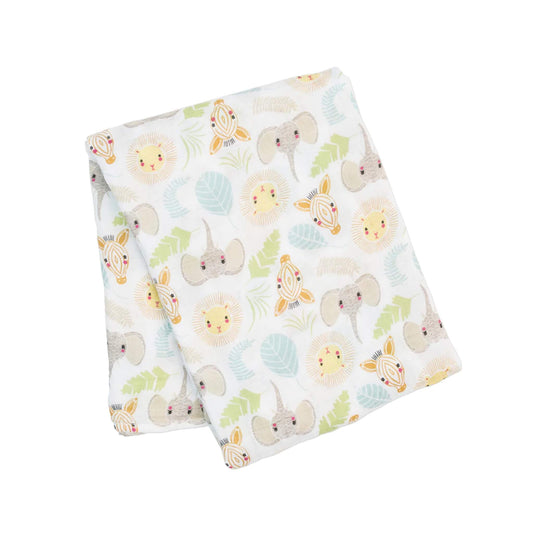 Cotton muslin swaddle neatly folded to show the Jungle Safari print with elephants, lions, zebras and leaves in soft pastel tones.
