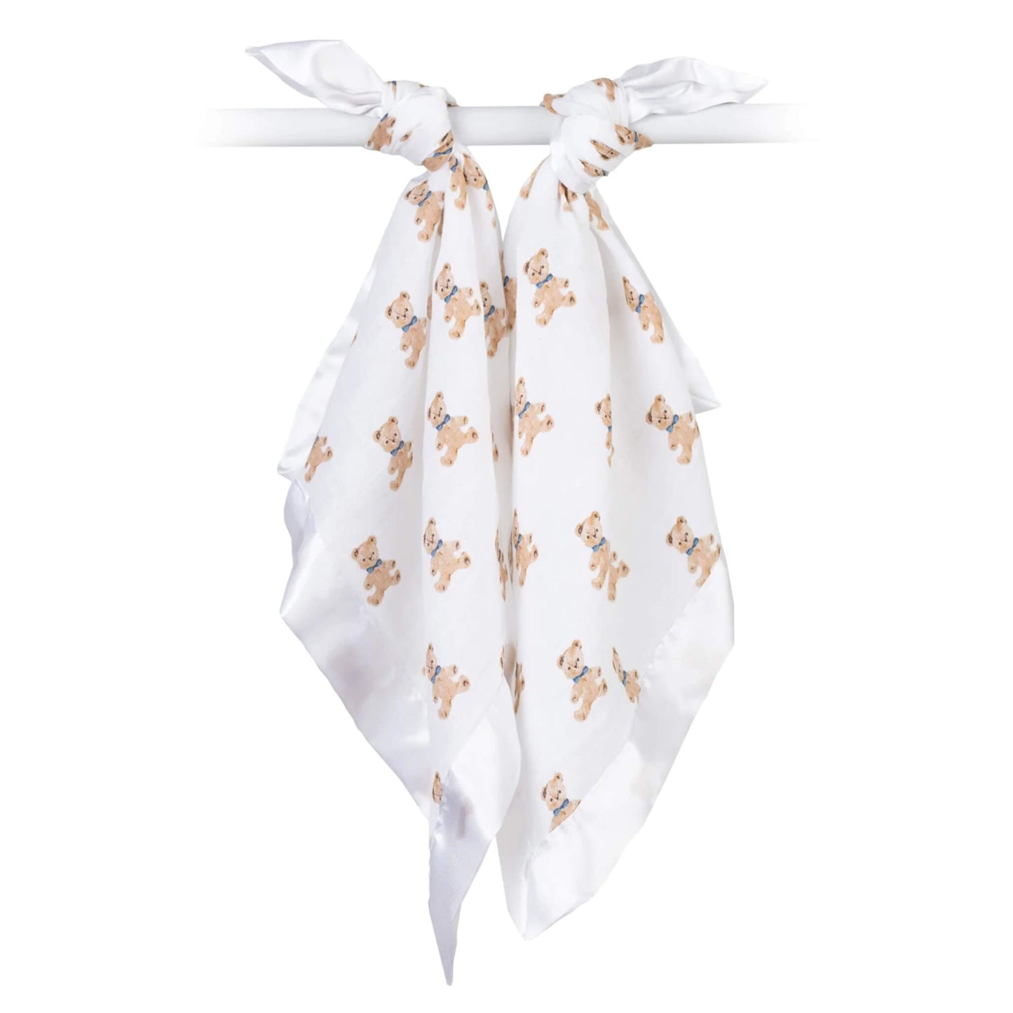 Pair of white muslin comfort blankets with teddy bear design, tied over a rail to display their lightweight fabric.