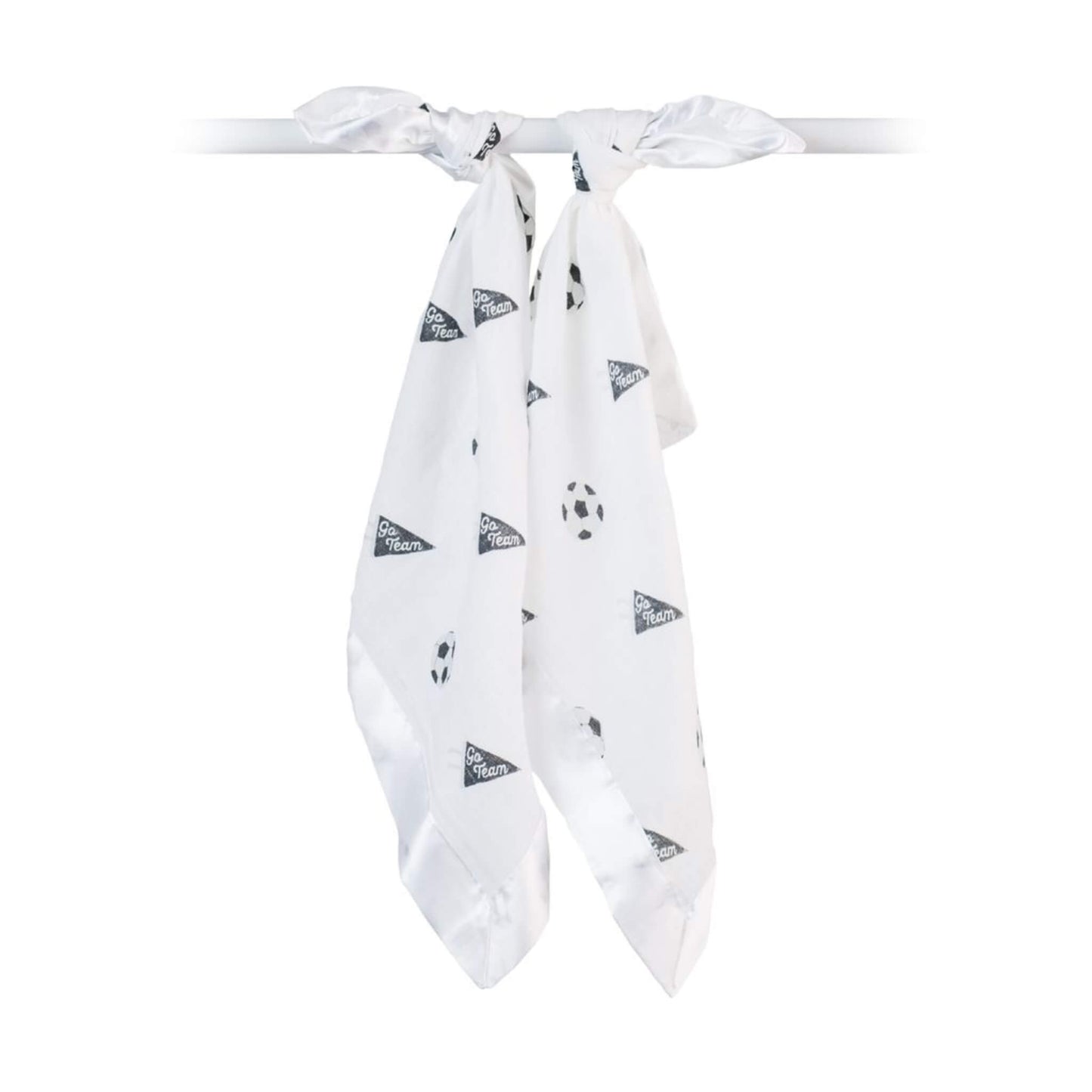 Two white muslin comfort blankets tied onto a rail, featuring black football icons and ‘Go Team’ pennant prints with satin edging.
