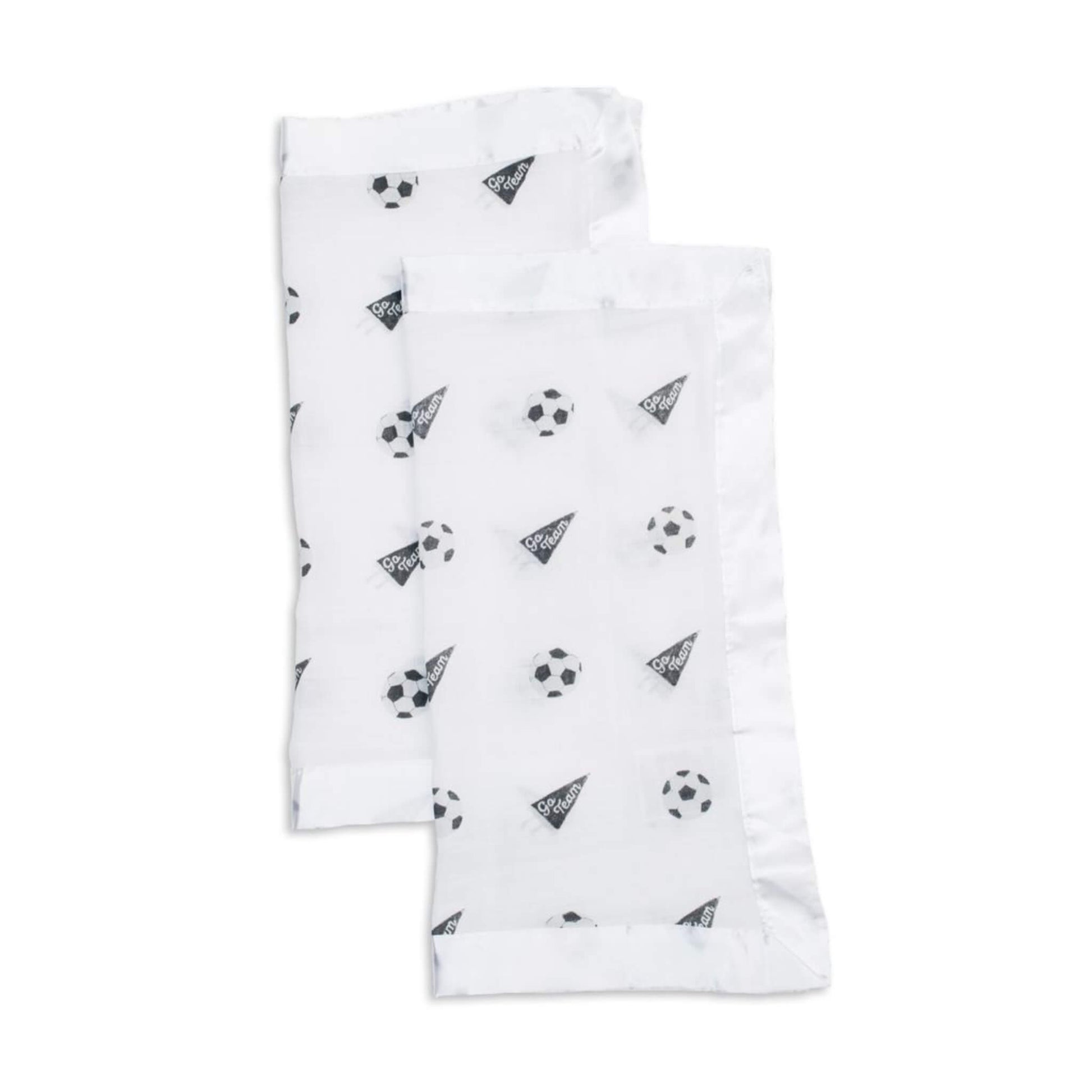 A pair of folded white muslin security blankets with black football pattern and ‘Go Team’ flag design, finished with smooth satin borders.