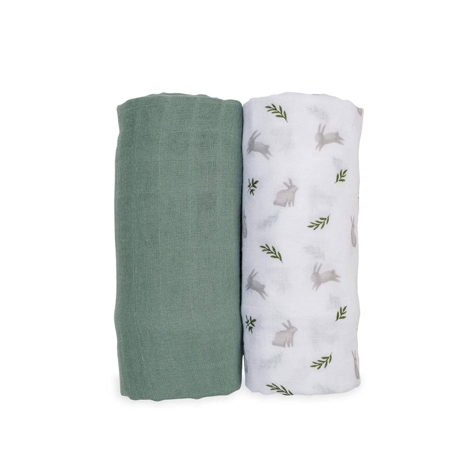 Two Lulujo Muslin Swaddles shown rolled side by side, one solid sage green and one white with soft grey bunny and green fern print.