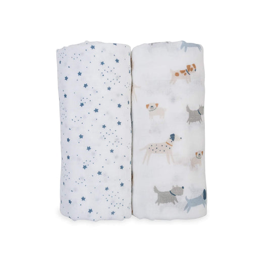 Pack of 2 Lulujo Muslin Swaddles with Puppy Dogs & Stars print rolled side by side, one printed with playful dogs and one with blue stars on a white background.