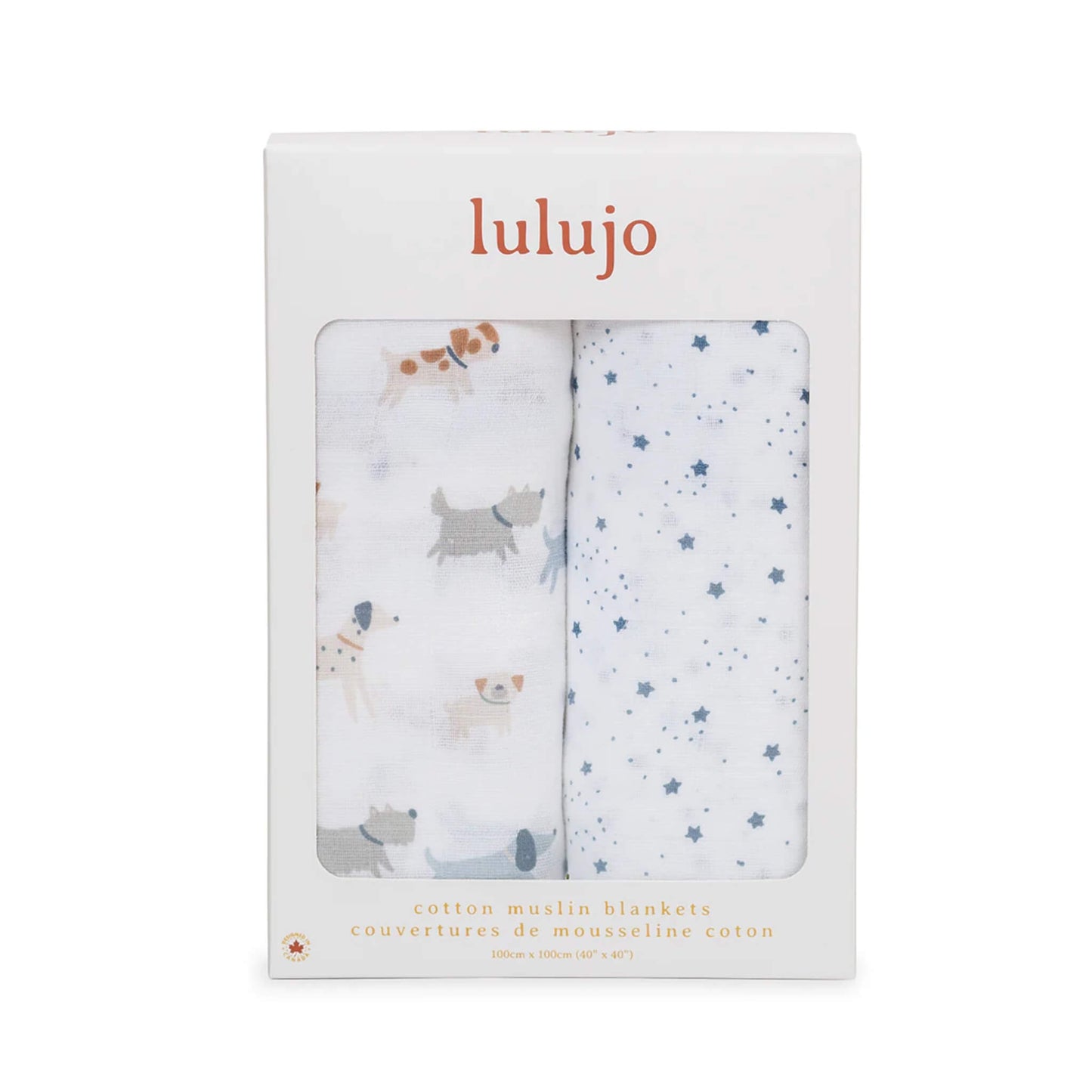 Boxed Lulujo 2-pack cotton muslin swaddles showing one dog print and one star print through the packaging window.