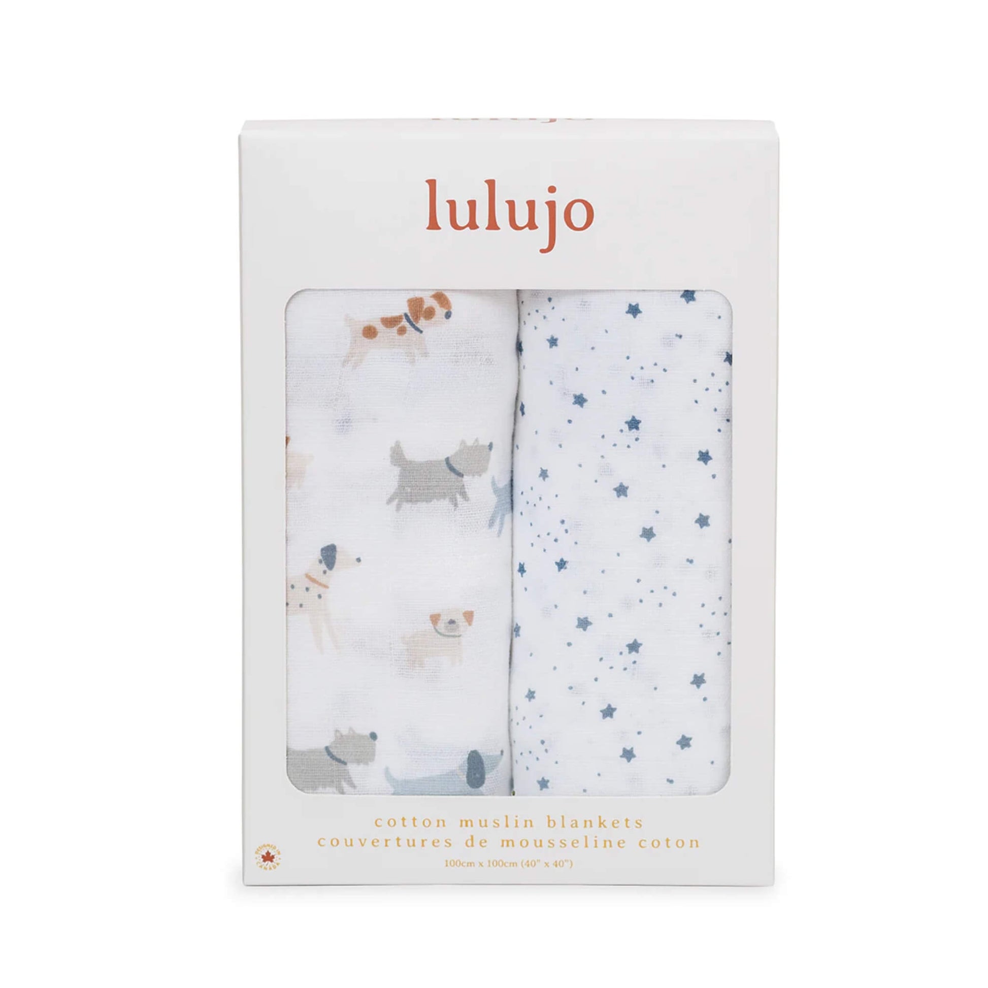 Boxed Lulujo 2-pack cotton muslin swaddles showing one dog print and one star print through the packaging window.