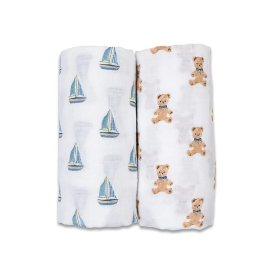 Pack of 2 Lulujo Muslin Swaddles with vintage Bears & Sailboats rolled side by side, one printed with teddy bears and one with blue sailboats on white muslin fabric.