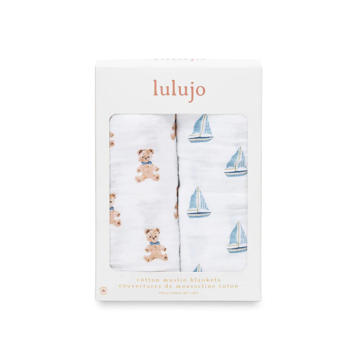 Boxed Lulujo 2-pack cotton muslin swaddles showing one bear print and one sailboat print through the packaging window.