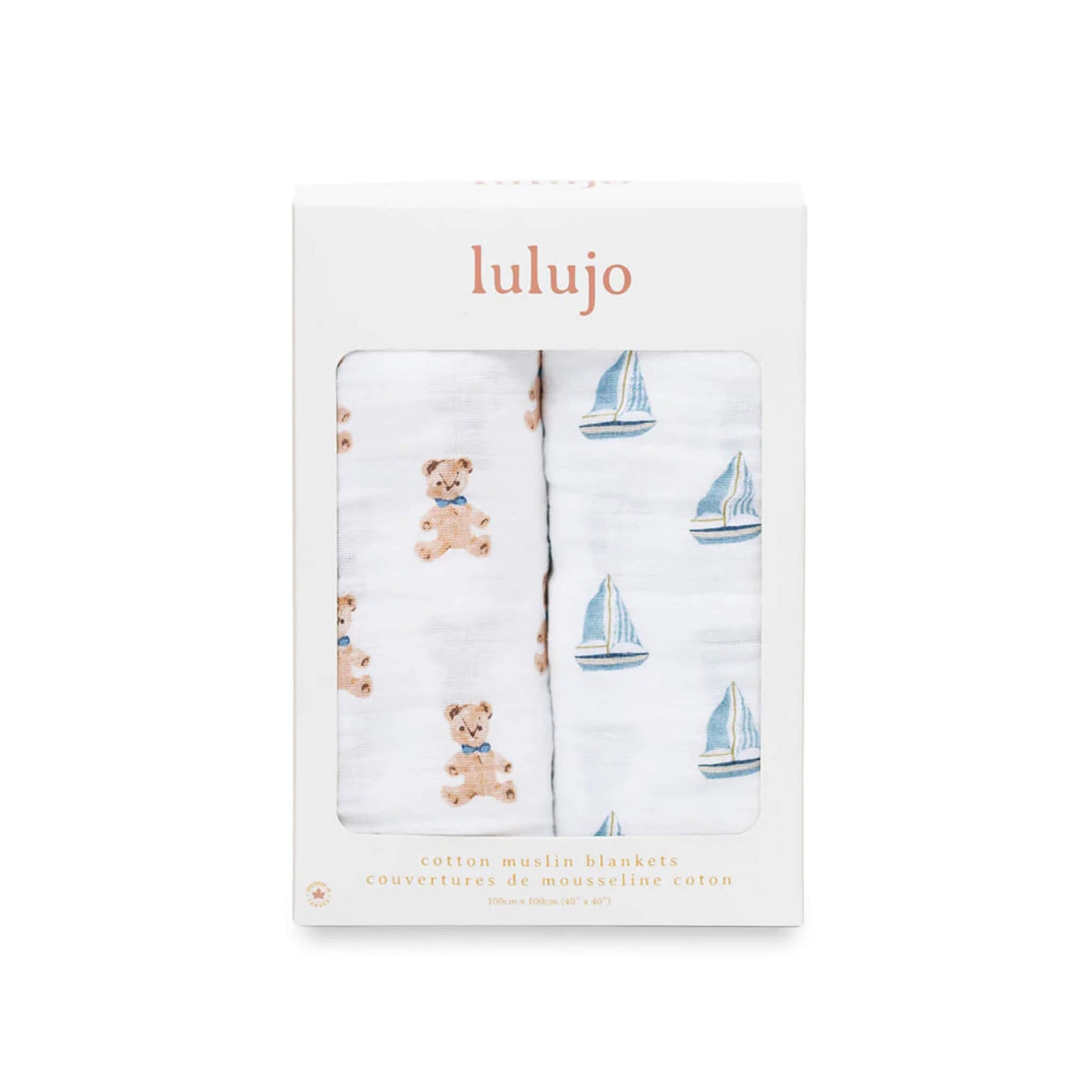 Boxed Lulujo 2-pack cotton muslin swaddles showing one bear print and one sailboat print through the packaging window.