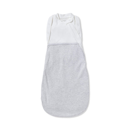 MORI Newborn Swaddle Bag in Grey shown laid flat with a white upper panel and soft grey lower section, highlighting the wrap-style chest and shoulder poppers.