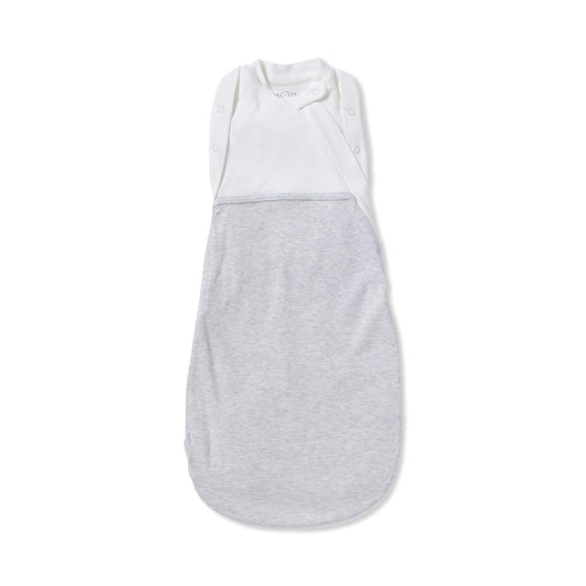 MORI Newborn Swaddle Bag in Grey shown laid flat with a white upper panel and soft grey lower section, highlighting the wrap-style chest and shoulder poppers.