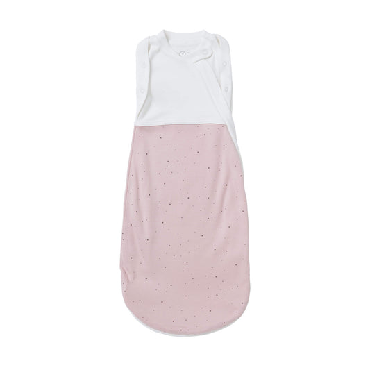 MORI Newborn Swaddle Bag in Stardust design, soft pink bag with tiny scattered dots and white upper panel laid flat on a plain background.