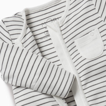 A close-up of a grey striped baby sleepsuit showing the soft neckline, concealed zip and small white chest pocket.