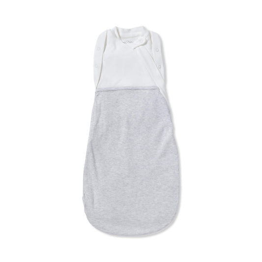 Newborn Swaddle Bag to replicate the natural cuddle of the womb. Crafted from organic cotton and bamboo for a soft feel on your baby's skin. It also has adjustable arm poppers so your baby can be snugly tucked in or given some freedom to have their arms out. 